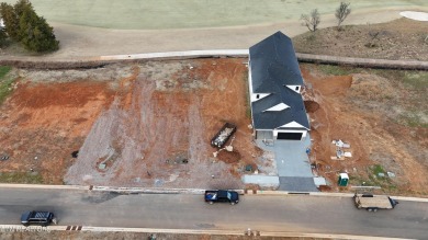 This charming lot is ideally located, backing up to a stunning on Tennessee National Golf Club in Tennessee - for sale on GolfHomes.com, golf home, golf lot