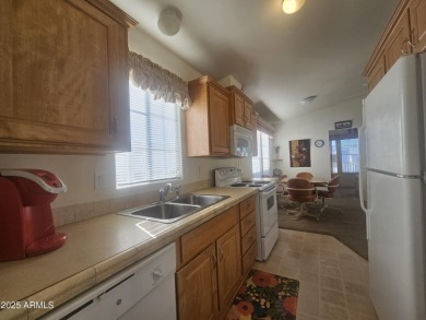 This 2-bedroom, 2-bathroom home features a large storage shed on Viewpoint Golf Resort in Arizona - for sale on GolfHomes.com, golf home, golf lot