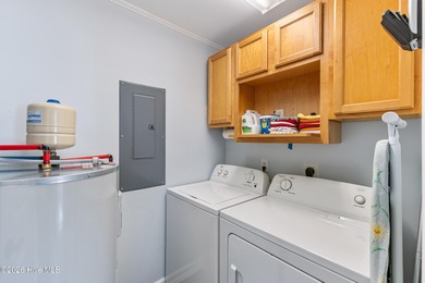 Welcome this bright and airy Club Villa condo in gated St James on Members Club At St. James Plantation in North Carolina - for sale on GolfHomes.com, golf home, golf lot