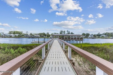 Welcome this bright and airy Club Villa condo in gated St James on Members Club At St. James Plantation in North Carolina - for sale on GolfHomes.com, golf home, golf lot
