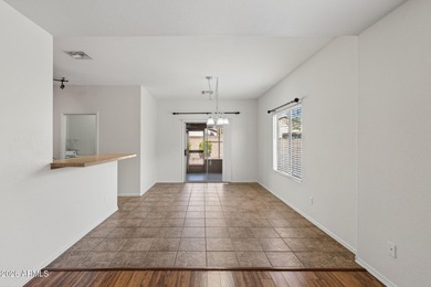 Exceptional move-in ready home in the premier Johnson Ranch on The Golf Club At Johnson Ranch in Arizona - for sale on GolfHomes.com, golf home, golf lot