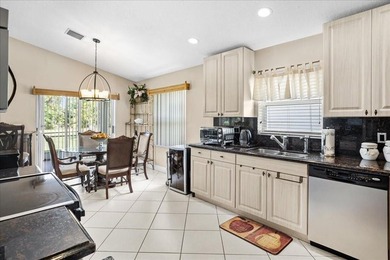 Welcome to this stunning home in a gated community and golfer's on Westchester Golf and Country Club in Florida - for sale on GolfHomes.com, golf home, golf lot