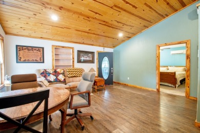 Cozy Cabin Nestled Among Wooded Setting on Oak Run Golf Course in Illinois - for sale on GolfHomes.com, golf home, golf lot