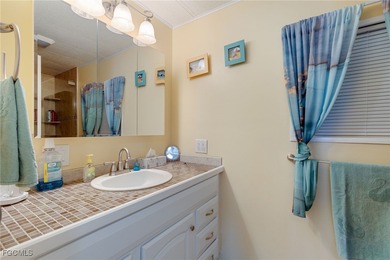 Welcome to this beautifully maintained manufactured home located on Bonita Fairways in Florida - for sale on GolfHomes.com, golf home, golf lot