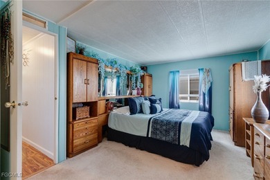 Welcome to this beautifully maintained manufactured home located on Bonita Fairways in Florida - for sale on GolfHomes.com, golf home, golf lot