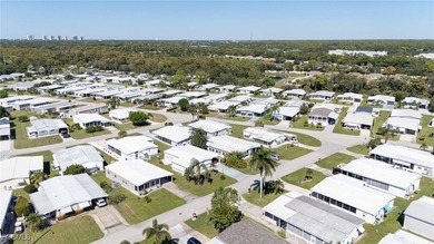 Welcome to this beautifully maintained manufactured home located on Bonita Fairways in Florida - for sale on GolfHomes.com, golf home, golf lot