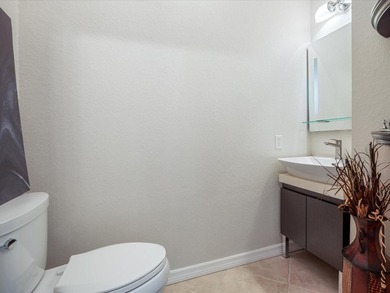 Tucked away on a quiet cul-de-sac, this exceptional on East Lake Woodlands Country Club in Florida - for sale on GolfHomes.com, golf home, golf lot