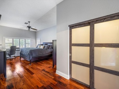 Tucked away on a quiet cul-de-sac, this exceptional on East Lake Woodlands Country Club in Florida - for sale on GolfHomes.com, golf home, golf lot