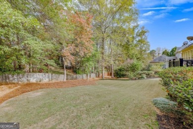 Welcome to this stunning home located in one of Woodstock's most on Towne Lake Hills Golf Club in Georgia - for sale on GolfHomes.com, golf home, golf lot