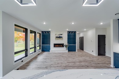 Experience refined modern living in this stunning 2025 on Indian Lake Golf and Country Club in Michigan - for sale on GolfHomes.com, golf home, golf lot