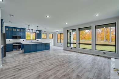 Experience refined modern living in this stunning 2025 on Indian Lake Golf and Country Club in Michigan - for sale on GolfHomes.com, golf home, golf lot