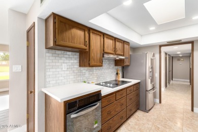 Beautifully updated home on a prime Golf Course Lot! Wood-look on Sun City-Willow Creek / Willow Brook  in Arizona - for sale on GolfHomes.com, golf home, golf lot