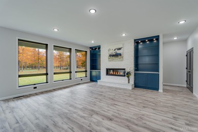 Experience refined modern living in this stunning 2025 on Indian Lake Golf and Country Club in Michigan - for sale on GolfHomes.com, golf home, golf lot