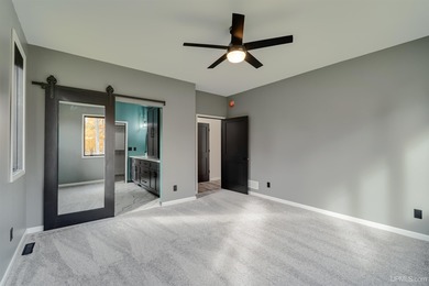 Experience refined modern living in this stunning 2025 on Indian Lake Golf and Country Club in Michigan - for sale on GolfHomes.com, golf home, golf lot