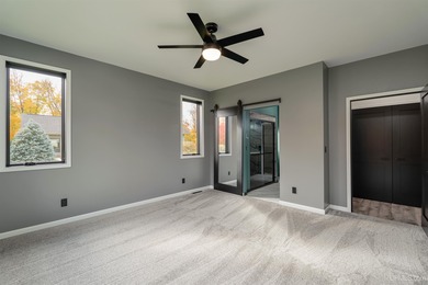 Experience refined modern living in this stunning 2025 on Indian Lake Golf and Country Club in Michigan - for sale on GolfHomes.com, golf home, golf lot