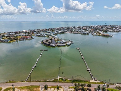 This stunning condo is perfectly situated in a pristine location on Rockport Country Club in Texas - for sale on GolfHomes.com, golf home, golf lot