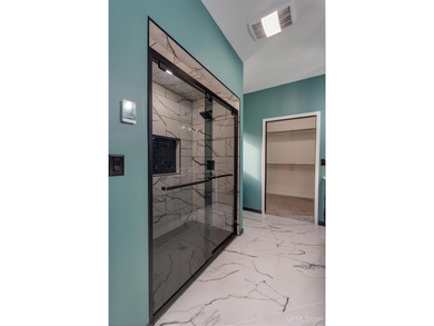 Experience refined modern living in this stunning 2025 on Indian Lake Golf and Country Club in Michigan - for sale on GolfHomes.com, golf home, golf lot