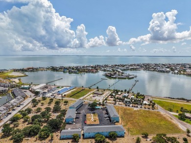 This stunning condo is perfectly situated in a pristine location on Rockport Country Club in Texas - for sale on GolfHomes.com, golf home, golf lot