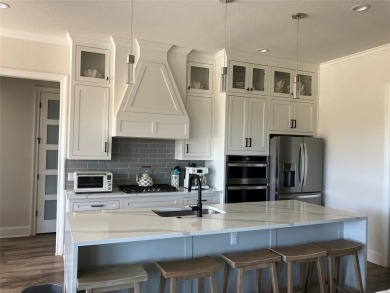 Luxury and tranquility in this 3 bedroom, 2 bath masterpiece at on White Bluff Resort - New Course in Texas - for sale on GolfHomes.com, golf home, golf lot
