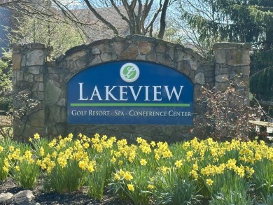 Escape to your own retreat nestled between shimmering Cheat Lake on Lakeview Golf Resort and Spa - Lakeview in West Virginia - for sale on GolfHomes.com, golf home, golf lot