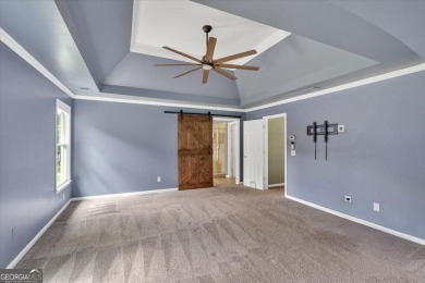 Welcome to this stunning executive home in highly desired on The Governors Towne Club in Georgia - for sale on GolfHomes.com, golf home, golf lot