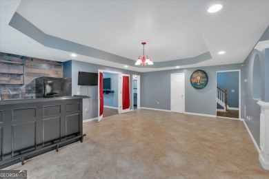 Welcome to this stunning executive home in highly desired on The Governors Towne Club in Georgia - for sale on GolfHomes.com, golf home, golf lot