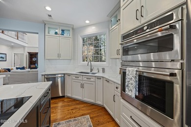 This gorgeous golf front home sits on two lots in a peaceful on Pinewild Country Club of Pinehurst in North Carolina - for sale on GolfHomes.com, golf home, golf lot