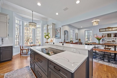 This gorgeous golf front home sits on two lots in a peaceful on Pinewild Country Club of Pinehurst in North Carolina - for sale on GolfHomes.com, golf home, golf lot