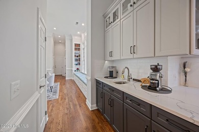 This gorgeous golf front home sits on two lots in a peaceful on Pinewild Country Club of Pinehurst in North Carolina - for sale on GolfHomes.com, golf home, golf lot