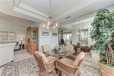 Impeccably maintained and beautifully styled with coastal decor on Sarasota National Golf Club in Florida - for sale on GolfHomes.com, golf home, golf lot
