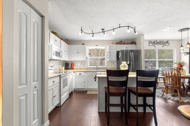 Welcome to this charming 2-bedroom, 2-bathroom end unit in the on On Top of the World Golf Course in Florida - for sale on GolfHomes.com, golf home, golf lot