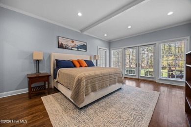 This gorgeous golf front home sits on two lots in a peaceful on Pinewild Country Club of Pinehurst in North Carolina - for sale on GolfHomes.com, golf home, golf lot