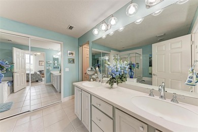 Impeccably maintained and beautifully styled with coastal decor on Sarasota National Golf Club in Florida - for sale on GolfHomes.com, golf home, golf lot