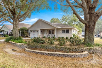 Welcome to this charming 2-bedroom, 2-bathroom end unit in the on On Top of the World Golf Course in Florida - for sale on GolfHomes.com, golf home, golf lot