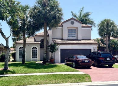 Beautiful lakefront house at Boca Pointe Country Club. Club on Boca Pointe Country Club in Florida - for sale on GolfHomes.com, golf home, golf lot