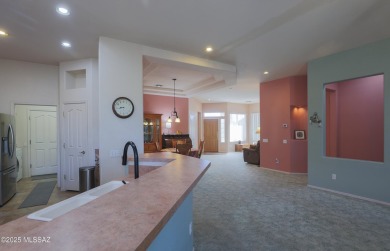 Popular Portland model home on the Fourth Hole of the Highlands on Heritage Highlands At Dove Mountain in Arizona - for sale on GolfHomes.com, golf home, golf lot