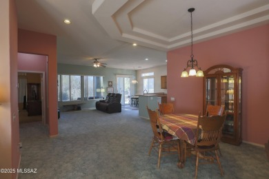 Popular Portland model home on the Fourth Hole of the Highlands on Heritage Highlands At Dove Mountain in Arizona - for sale on GolfHomes.com, golf home, golf lot
