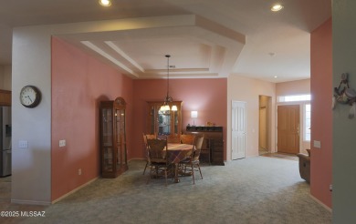 Popular Portland model home on the Fourth Hole of the Highlands on Heritage Highlands At Dove Mountain in Arizona - for sale on GolfHomes.com, golf home, golf lot