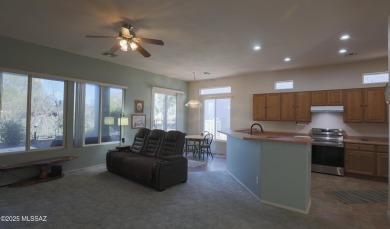 Popular Portland model home on the Fourth Hole of the Highlands on Heritage Highlands At Dove Mountain in Arizona - for sale on GolfHomes.com, golf home, golf lot