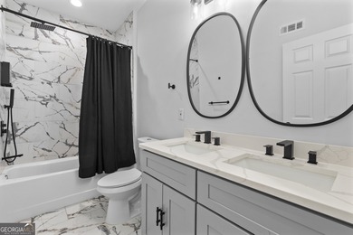 Welcome to this stunning contemporary home in sought-after East on East Lake Golf Club in Georgia - for sale on GolfHomes.com, golf home, golf lot