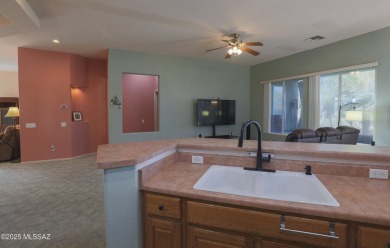 Popular Portland model home on the Fourth Hole of the Highlands on Heritage Highlands At Dove Mountain in Arizona - for sale on GolfHomes.com, golf home, golf lot