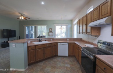 Popular Portland model home on the Fourth Hole of the Highlands on Heritage Highlands At Dove Mountain in Arizona - for sale on GolfHomes.com, golf home, golf lot