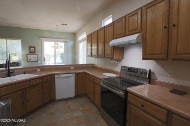 Popular Portland model home on the Fourth Hole of the Highlands on Heritage Highlands At Dove Mountain in Arizona - for sale on GolfHomes.com, golf home, golf lot