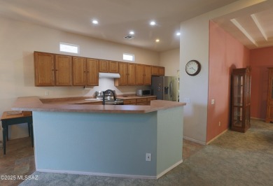 Popular Portland model home on the Fourth Hole of the Highlands on Heritage Highlands At Dove Mountain in Arizona - for sale on GolfHomes.com, golf home, golf lot