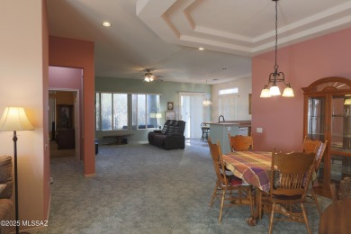 Popular Portland model home on the Fourth Hole of the Highlands on Heritage Highlands At Dove Mountain in Arizona - for sale on GolfHomes.com, golf home, golf lot