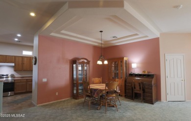 Popular Portland model home on the Fourth Hole of the Highlands on Heritage Highlands At Dove Mountain in Arizona - for sale on GolfHomes.com, golf home, golf lot