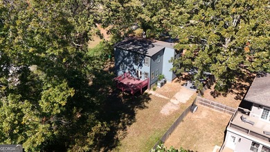 Welcome to this stunning contemporary home in sought-after East on East Lake Golf Club in Georgia - for sale on GolfHomes.com, golf home, golf lot