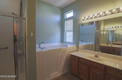 Popular Portland model home on the Fourth Hole of the Highlands on Heritage Highlands At Dove Mountain in Arizona - for sale on GolfHomes.com, golf home, golf lot