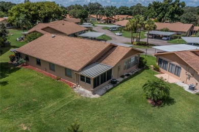 This neat and tidy Stuart floor plan has new porcelain tile
 on Kings Point Executive Golf Course in Florida - for sale on GolfHomes.com, golf home, golf lot