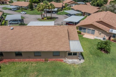 This neat and tidy Stuart floor plan has new porcelain tile
 on Kings Point Executive Golf Course in Florida - for sale on GolfHomes.com, golf home, golf lot